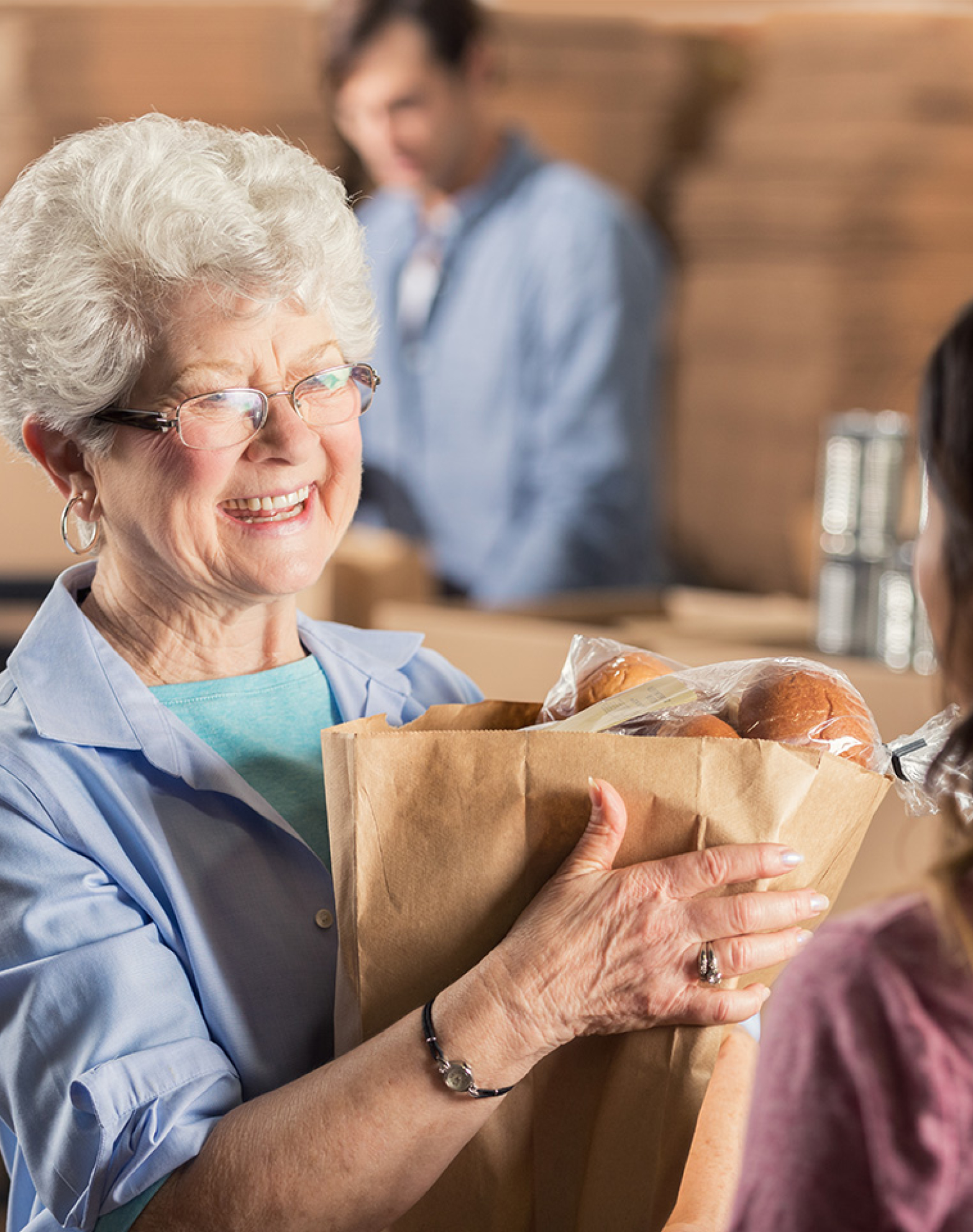 Woman with bag of groceries